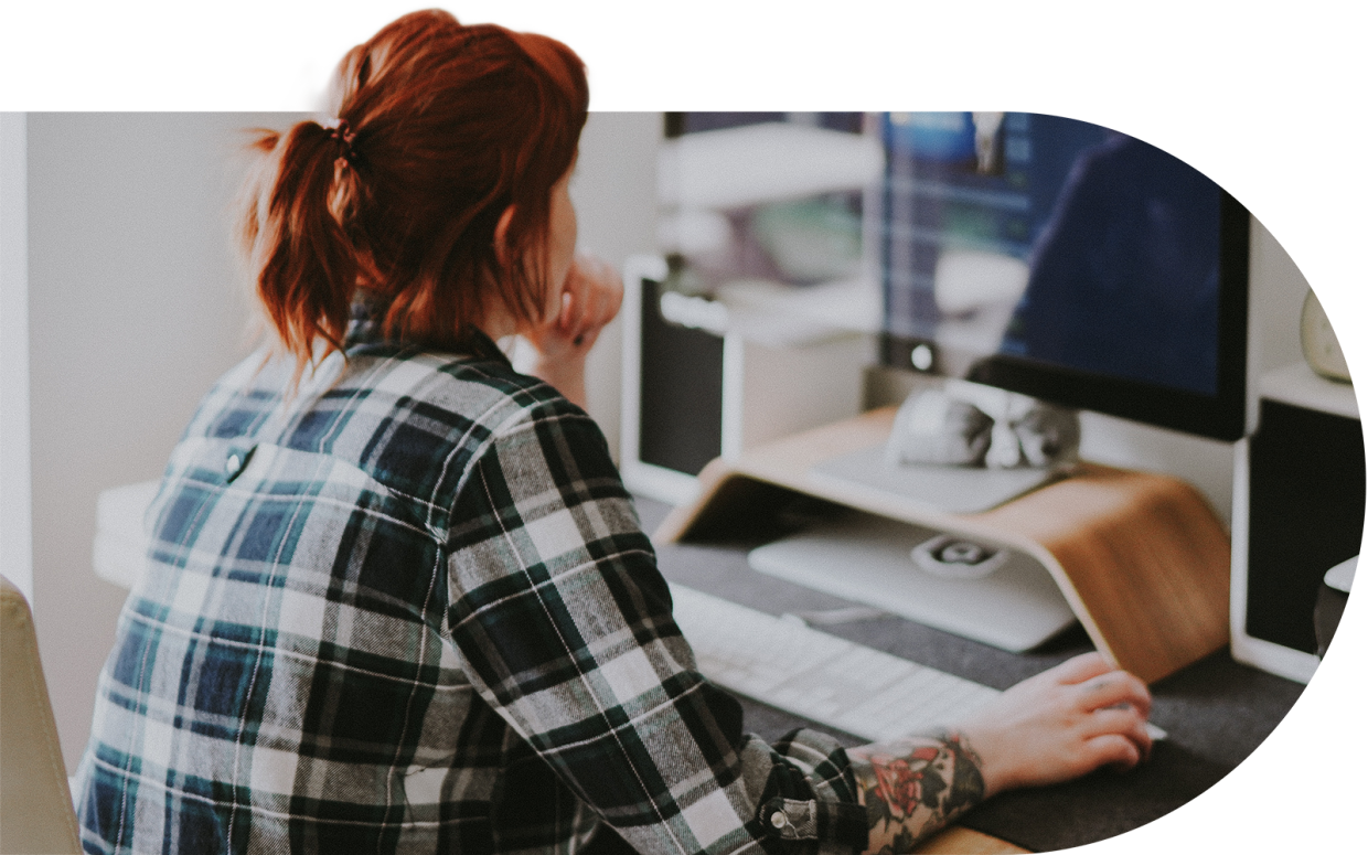 Young woman using a desktop computer